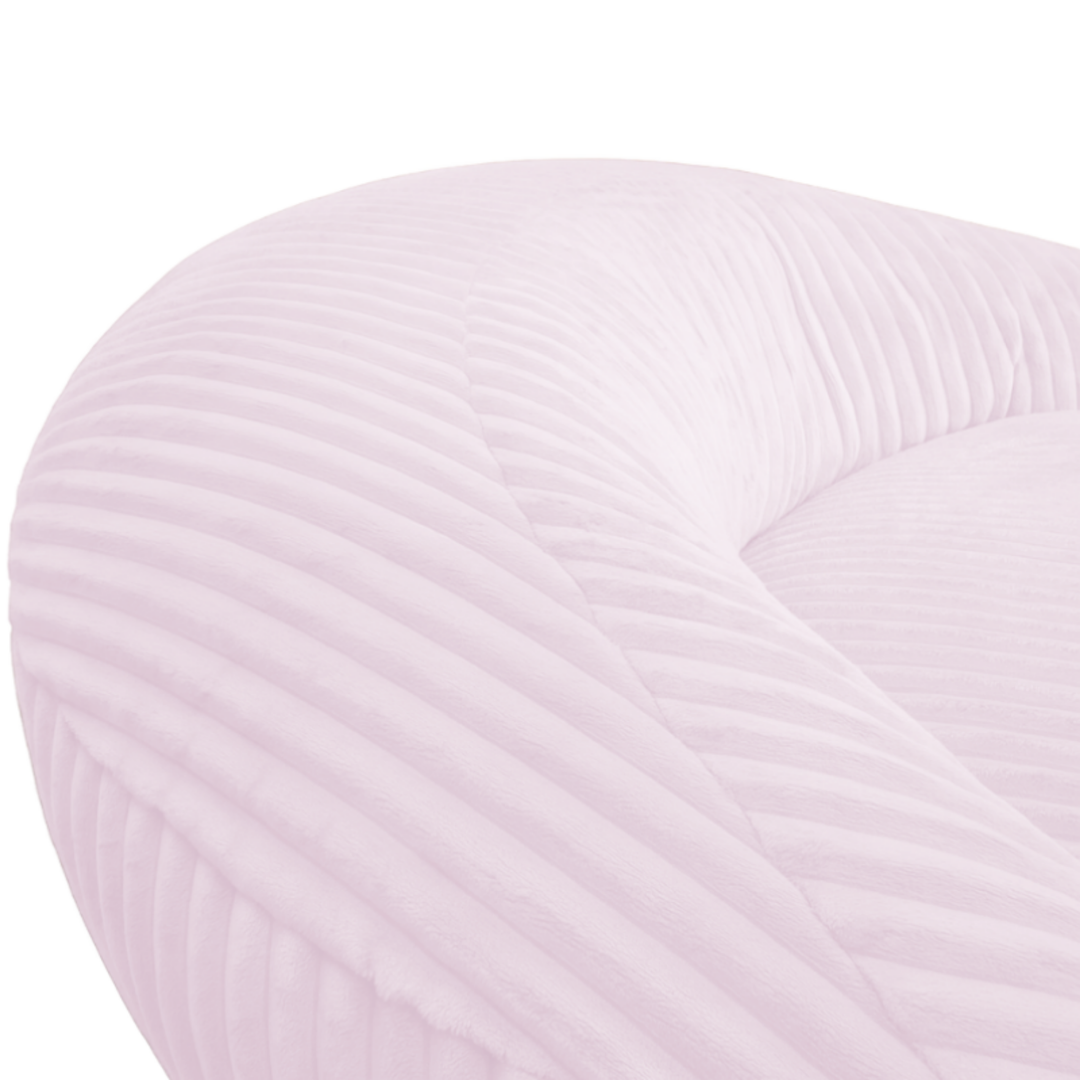 Gros plan sur le dossier arrondi du pouf XXL, tissu en velours côtelé.
