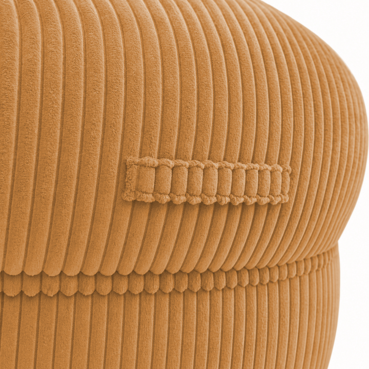 Gros plan sur la poignée du pouf XXL, tissu en velours côtelé.