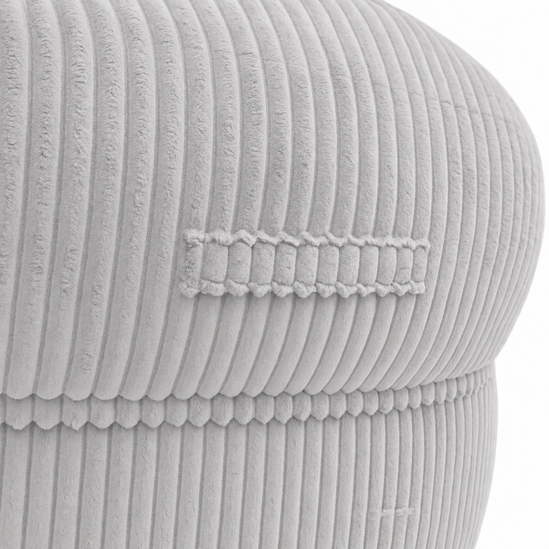 Gros plan sur la poignée du pouf XXL, tissu en velours côtelé.