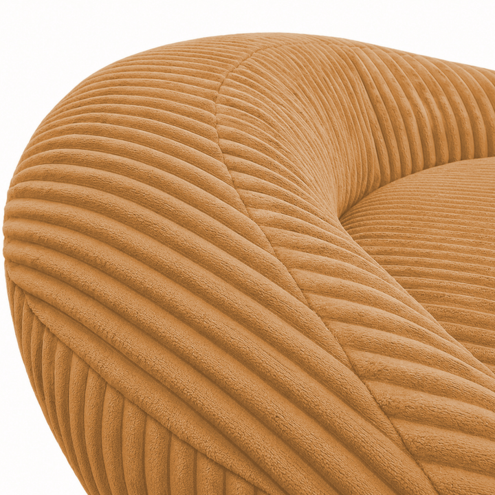 Gros plan sur le dossier arrondi du pouf XXL, tissu en velours côtelé.