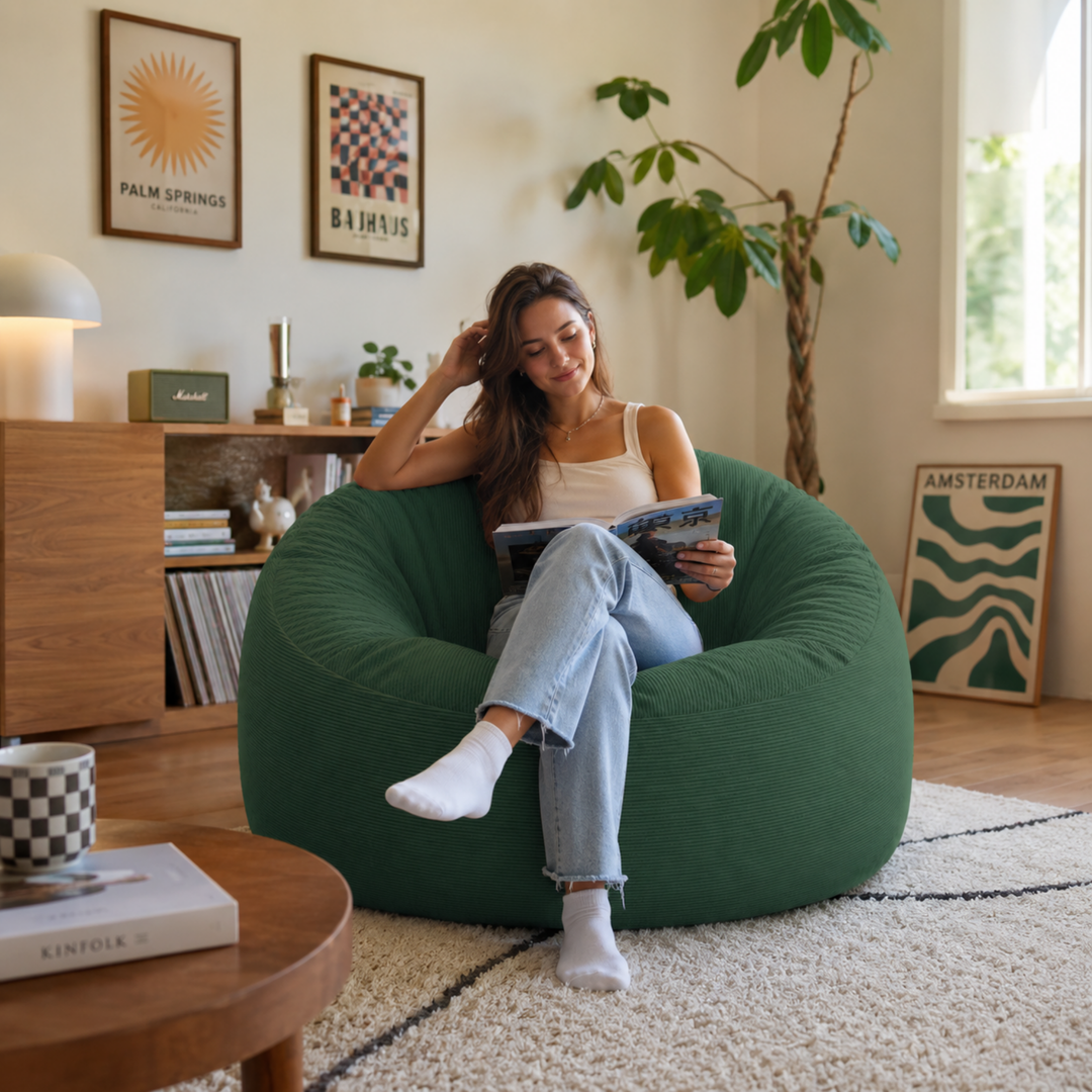 Pouf déhoussable 100 cm en velours côtelé vert foncé, assise enveloppante et confortable.