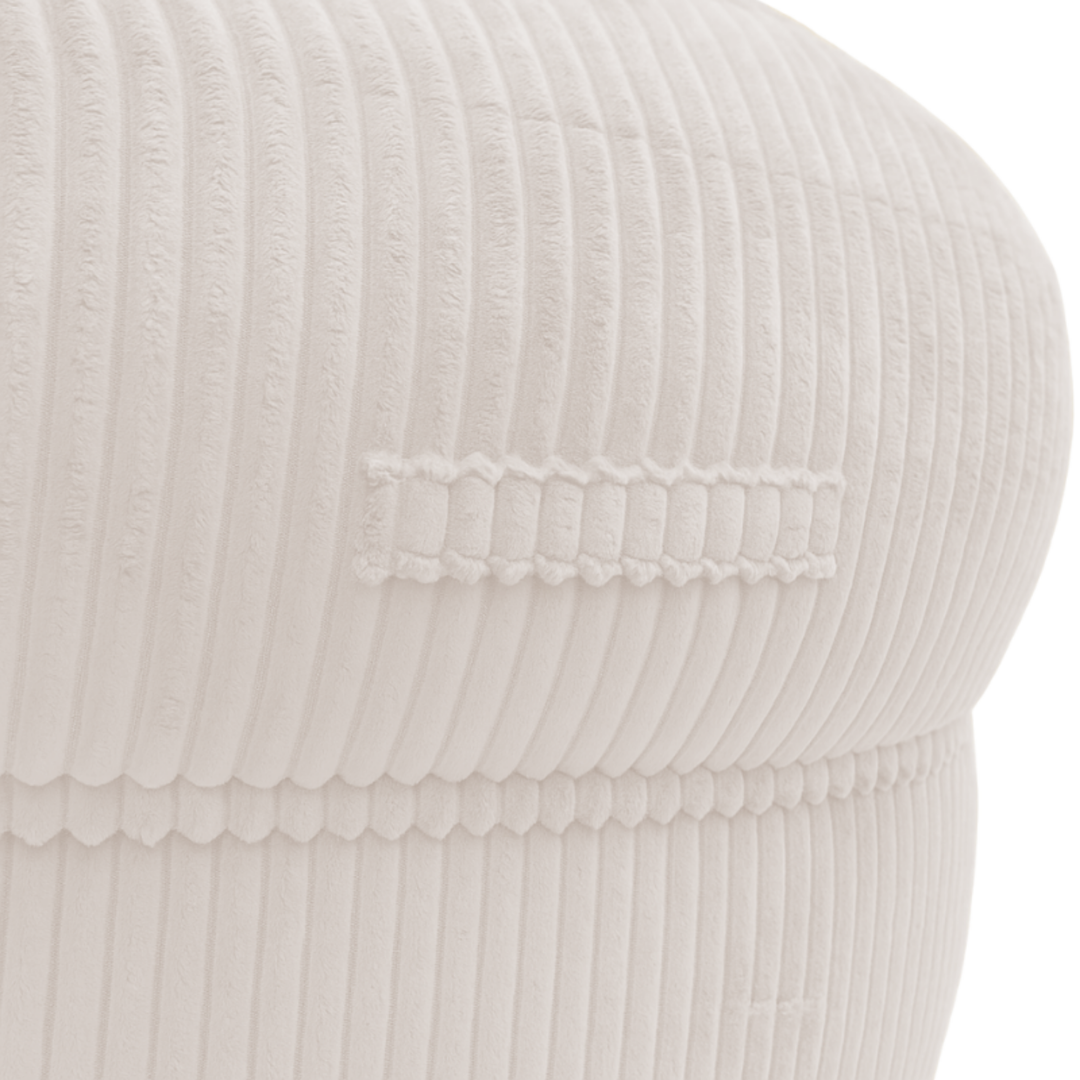 Gros plan sur la poignée du pouf XXL, tissu en velours côtelé.