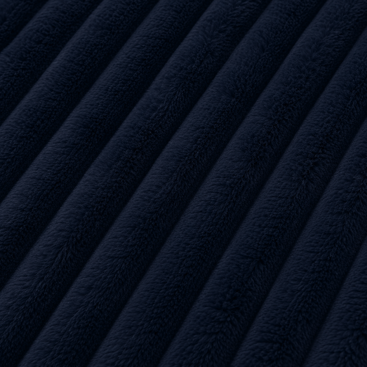 Tissu en fourrure côtelée bleu foncé à relief