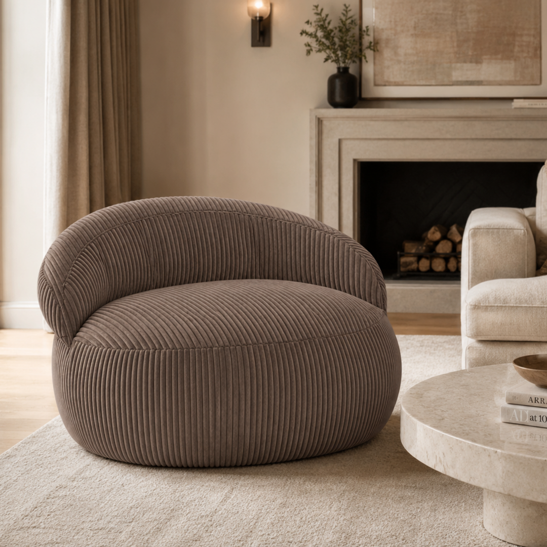 Pouf XXL déhoussable en velours côtelé, forme arrondie, dans un salon