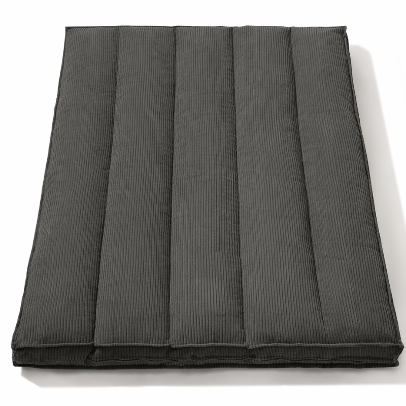 Futon déhoussable gris foncé, coutures verticales et velours côtelée.