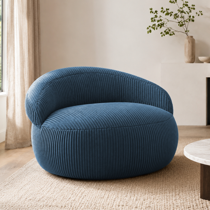 Pouf XXL déhoussable en velours côtelé, forme arrondie, dans un salon