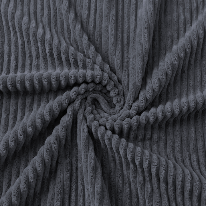 Détail de la housse en velours côtelé gris foncé, texture et relief du tissu